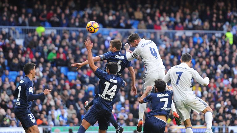 Sergio Ramos leapt above Malaga's defence to score the game's opening goal