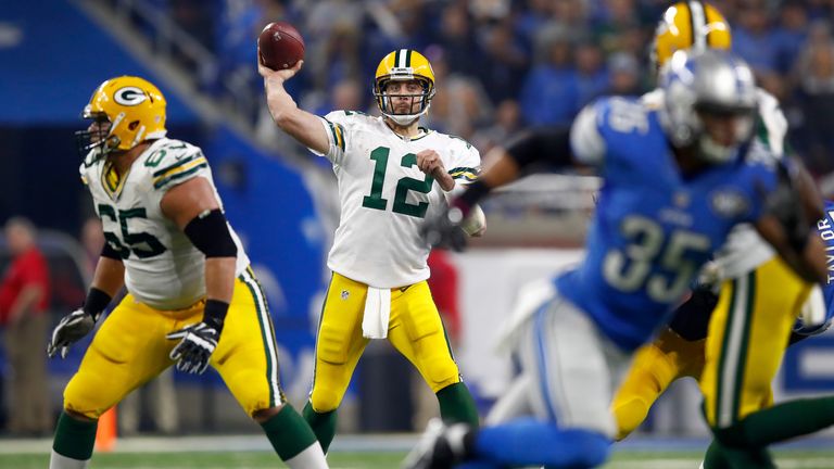 DETROIT, MI - JANUARY 1: Quarterback Aaron Rodgers #12 of the Green Bay Packers looks to pass down field against the Detroit Lions during second half actio