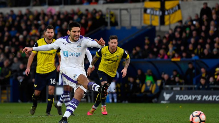 Aleksandar Mitrovic of Newcastle United misses a penalty against Oxford United