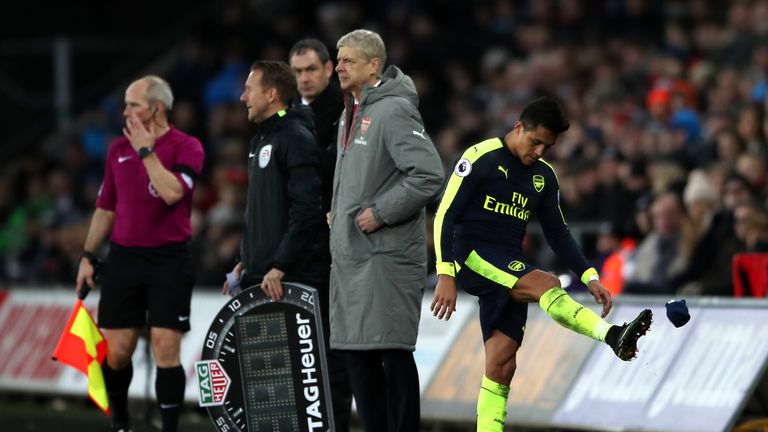 Arsenal's Alexis Sanchez shows his frustration at being substituted during the Premier League match at the Liberty Stadium, Swansea.