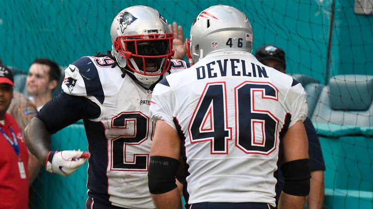 LeGarrette Blount #29 of the New England Patriots celebrates with James Develin #46