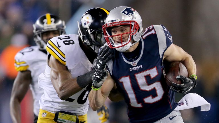 FOXBORO, MA - JANUARY 22:  Chris Hogan #15 of the New England Patriots runs with the ball against Sean Davis #28 of the Pittsburgh Steelers during the firs