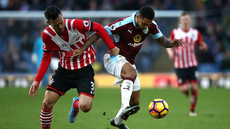 BURNLEY, ENGLAND - JANUARY 14:  Maya Yoshida of Southampton (L) and Andre Gray of Burnley (R) battle for possession during the Premier League match between