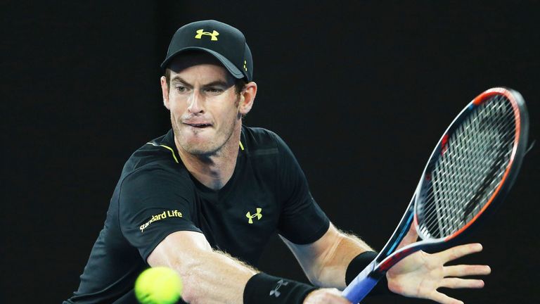 Andy Murray hits a backhand in his second round match against Andrey Rublev