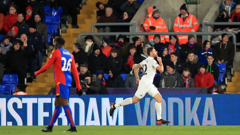 Swansea City's Angel Rangel celebrates scoring his side's second goal