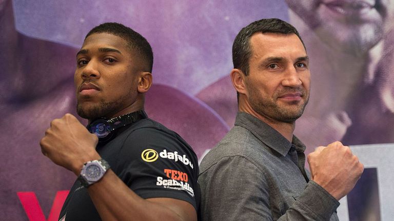 British boxer Anthony Joshua(L) and Wladimir Klitschko of the Ukraine meet during a news conference January 31, 2017 in Madison Square Garden 
