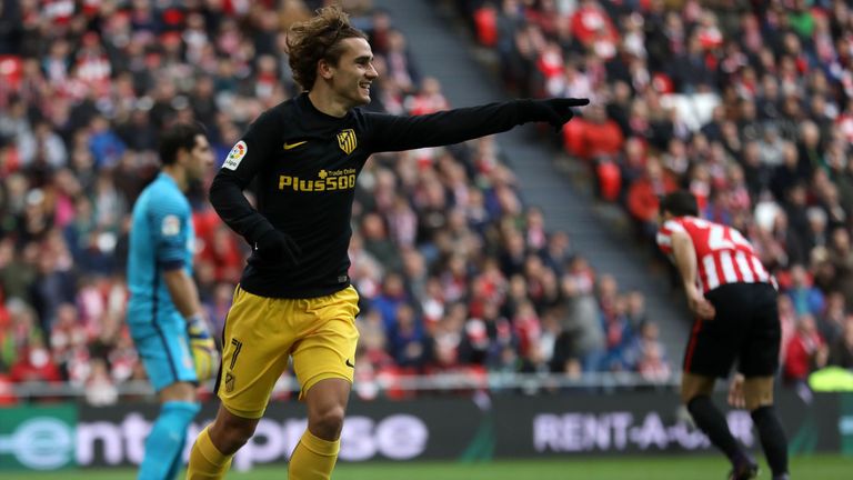 Atletico Madrid's French forward Antoine Griezmann celebrates after scoring during the Spanish league football match Athletic Club Bilbao vs Club Atletico 