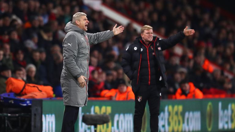 Arsene Wenger and Eddie Howe give instructions on the touchline  