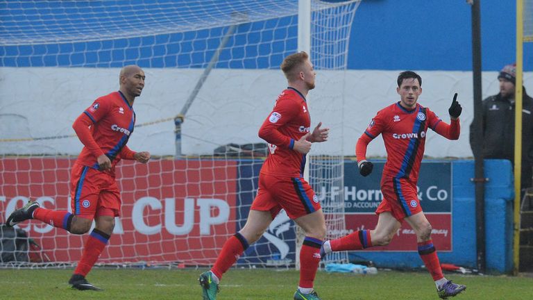 Ian Henderson of Rochdale (R) celebrates scoring his side's first goal during the FA Cup third round clash with Barrow