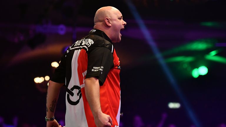 Jamie Hughes of England celebrates victory