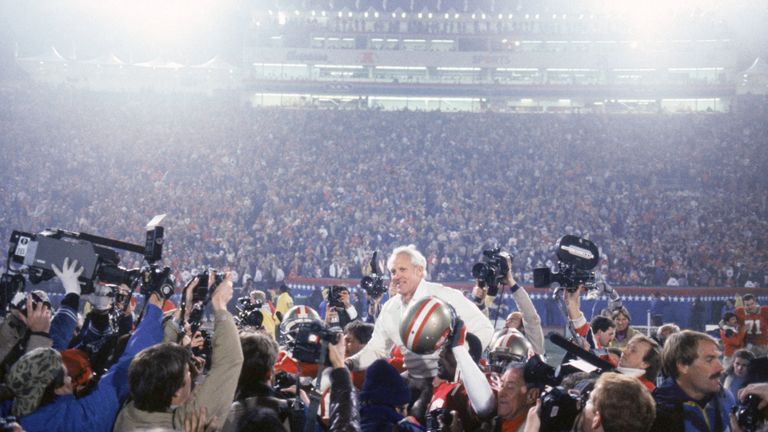 Walsh is held aloft after the 49ers crushed Miami in Super Bowl XIX