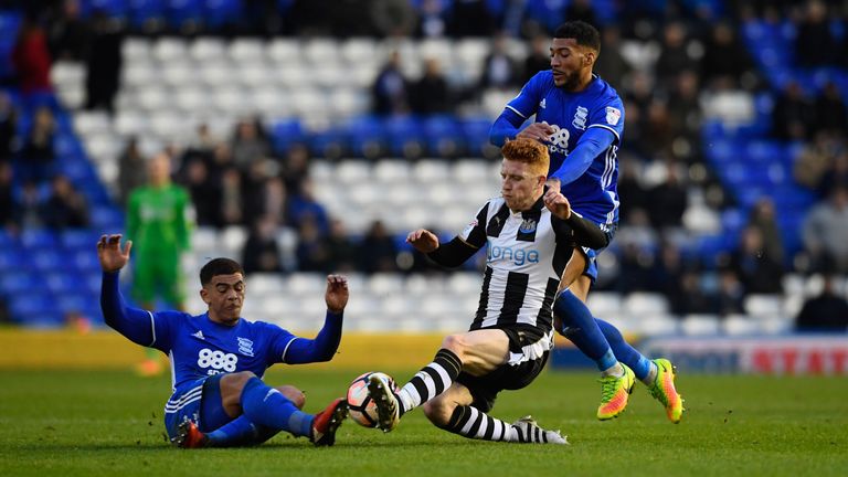 BIRMINGHAM, ENGLAND - JANUARY 07:  Newcastle player Jack Colback (r) challenges Che Adams (l) of Birmingham during The Emirates FA Cup Third Round match be