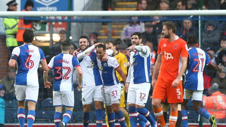 Elliott Bennett (4th L) of Blackburn Rovers celebrates after scoring