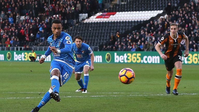 HULL, ENGLAND - JANUARY 14: Junior Stanislas of AFC Bournemouth celebrates scoring his sides first goal from the penalty spot during the Premier League mat