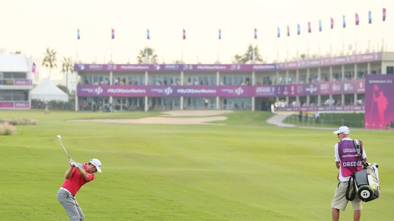 DOHA, QATAR - JANUARY 26:  Bradley Dredge of Wales plays his second shot on the 18th hole during the first round of the Commercial Bank Qatar Masters at th