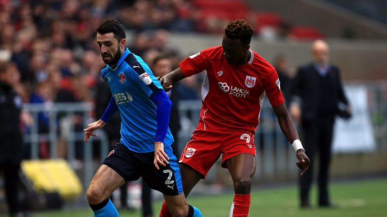 Conor McLaughlin of Fleetwood holds off pressure from Tammy Abraham of Bristol City