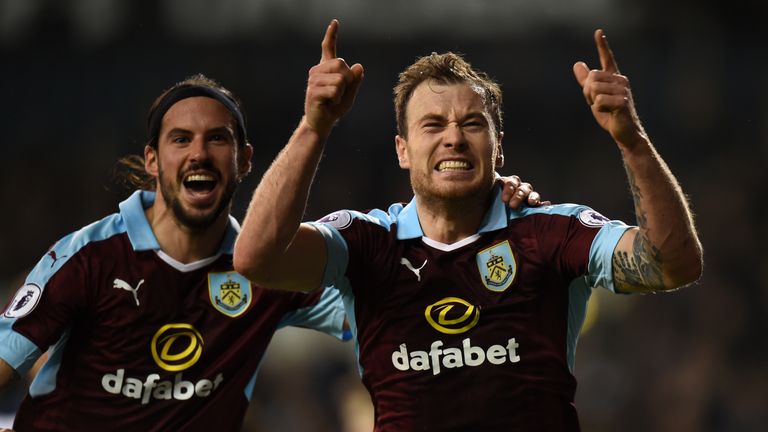 LONDON, ENGLAND - DECEMBER 18: Ashley Barnes of Burnley (R) celebrates scoring his sides first goal with George Boyd of Burnley (L) during the Premier Leag