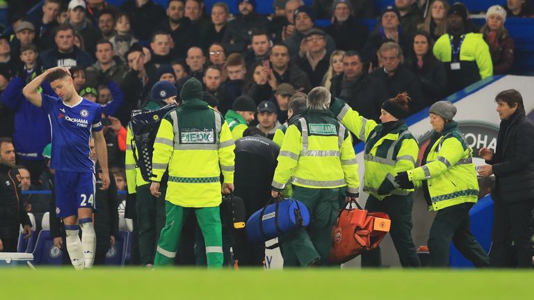 Gary Cahill shows his concern as Mason is treated at Stamford Bridge