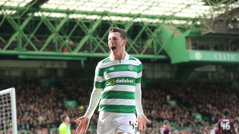 Callum McGregor celebrates after scoring Celtic's first goal against Hearts