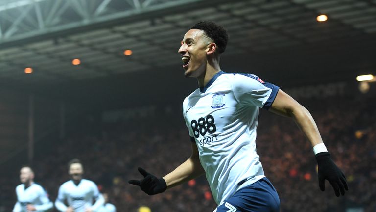 Callum Robinson of Preston celebrates scoring the opening goal against Arsenal in the FA Cup third round at Deepdale