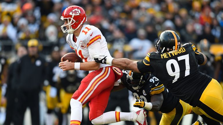PITTSBURGH, PA - DECEMBER 21:  Alex Smith #11 of the Kansas City Chiefs tries to avoid a tackle by Jason Worilds #93 and Cameron Heyward #97 of the Pittsbu
