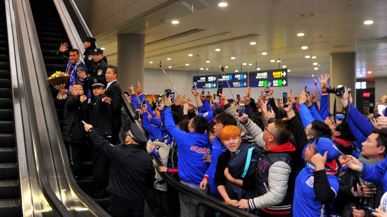 Carlos Tevez arrives in Shanghai from Boca Juniors in Argentina