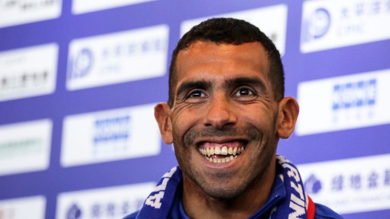 Argentine striker Carlos Tevez smiles during a press conference in Shanghai on January 21, 2017.
Tevez held his first press conference for his new club Sha