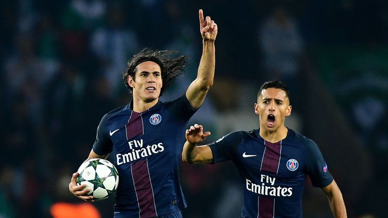 Edinson Cavani celebrates with PSG team-mate Marquinhos 