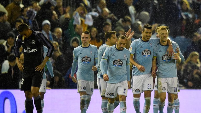 Celta Vigo's Danish midfielder Daniel Wass (R) celebrates with teammates after scoring during the Spanish Copa del Rey (King's Cup) quarter final second le