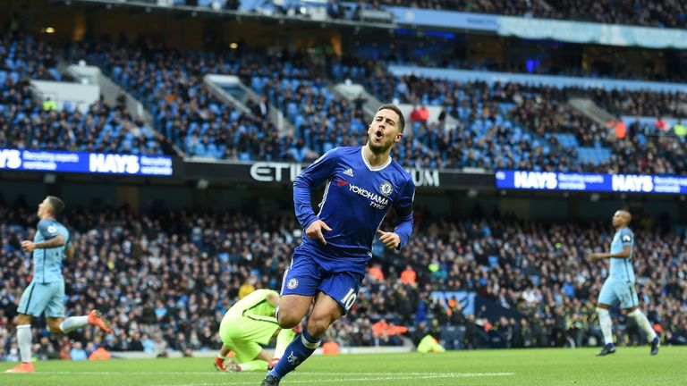 Chelsea's Belgian midfielder Eden Hazard celebrates scoring his team's third goal during the English Premier League football match between Manchester City 