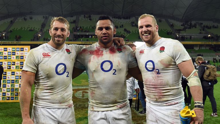 England's Billy Vunipola (C), James Haskell (R) and Chris Robshaw celebrate their victory at the end of the second international rugby union Test match bet