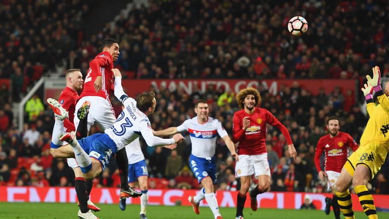 Chris Smalling heads home Man Utd's second goal against Wigan