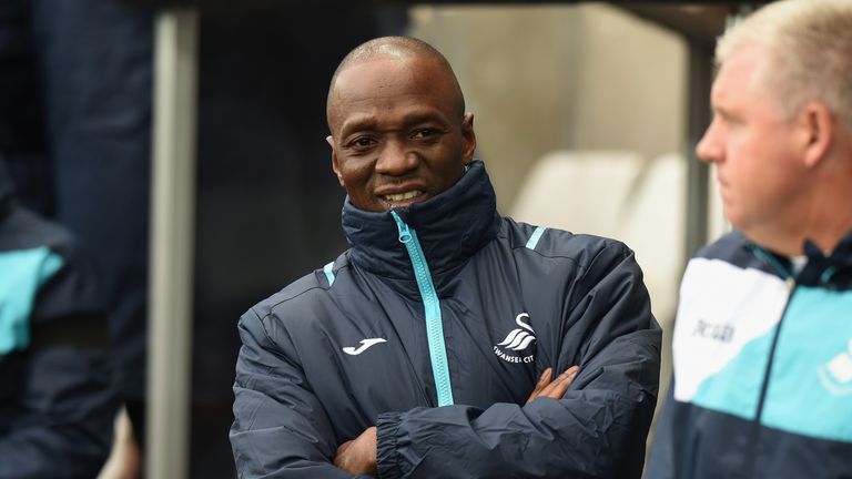 Claude Makelele looks on from the Swansea bench at Liberty Stadium