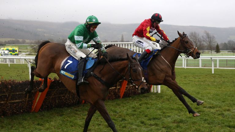 Cogry ridden by William Twiston-Davies (right) clears the last flight in company with Rocklander 