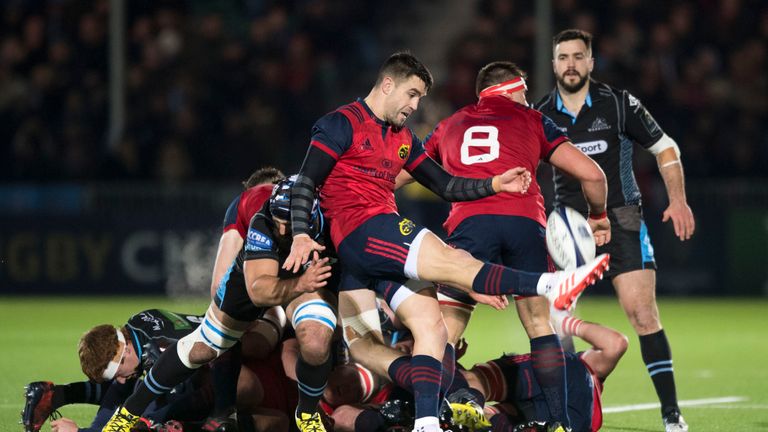 Conor Murray  is tackled by Josh Strauss