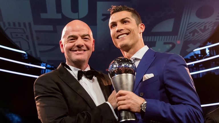 FIFA president Gianni Infantino (L) and The Best FIFA Men's Player Award winner Cristiano Ronaldo of Portugal and Real Madrid