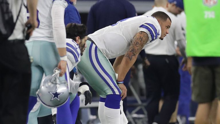 ARLINGTON, TX - JANUARY 15:  Dak Prescott #4 of the Dallas Cowboys reacts after losing to the Green Bay Packers in the NFC Divisional Playoff game at AT&T 