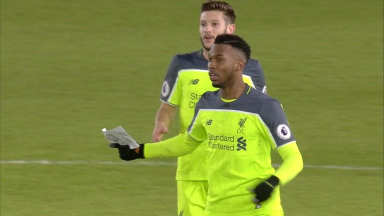 Daniel Sturridge carefully studied a note handed to him by Jurgen Klopp on the pitch during Liverpool's defeat by Southampton..