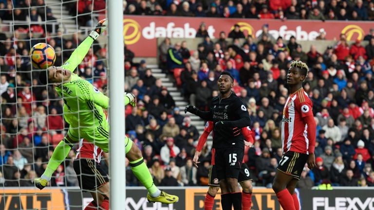 Daniel Sturridge scores his side's first goal past Vito Mannone of Sunderland