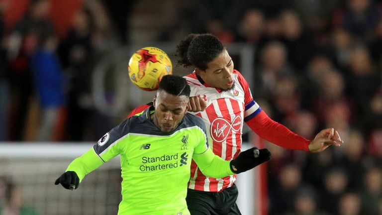 Liverpool's Daniel Sturridge (left) and Southampton's Virgil van Dijk battle for the ball during the EFL Cup Semi Final, First Leg match at St Mary's
