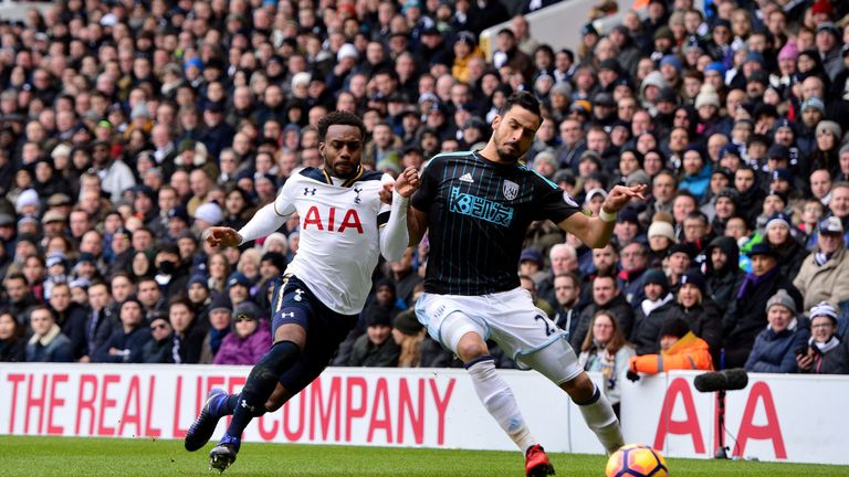 Danny Rose tangles with Nacer Chadli 