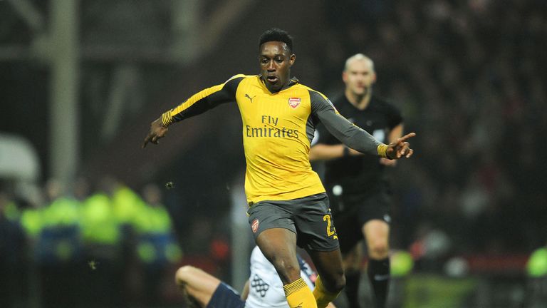 Danny Welbeck makes a run during the match between Preston North End and Arsenal at Deepdale