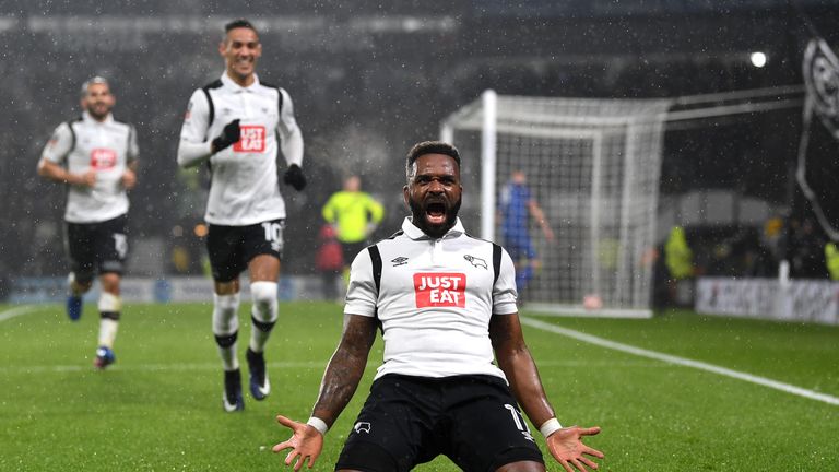 DERBY, ENGLAND - JANUARY 27:  Darren Bent of Derby County celebrates with team mates after scoring his sides first goal 
