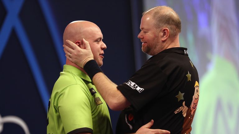 Raymond van Barneveld congratulates Michael van Gerwen 