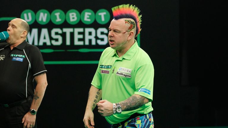 Peter Wright in action at the Masters (picture: Lawrence Lustig)