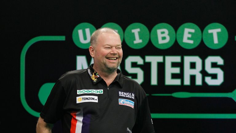 Raymond van Barneveld in action at the Masters (picture: Lawrence Lustig)