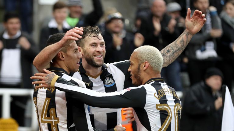 Newcastle United's Daryl Murphy (centre) celebrates scoring his side's first goal v Rotherham with team-mates Isaac Hayden (left) and Yoan Gouffran