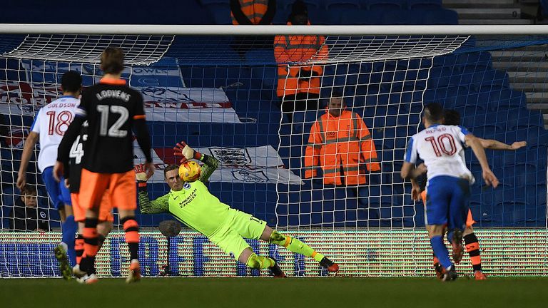 BRIGHTON, ENGLAND - JANUARY 20:  Goalkeeper David Stockdale of Brighton saves a penalty from Fernando Forestieri of Sheffield Wednesday during the Sky Bet 
