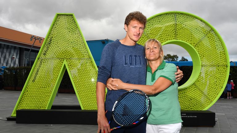 Denis Istomin of Uzbekistan poses with his mother Klaudiya who is also his coach