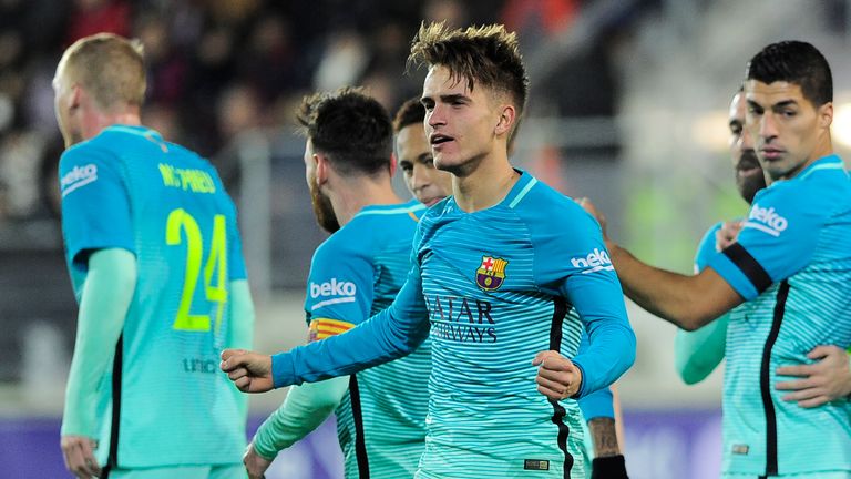 Denis Suarez (C) celebrates after scoring the opener during the Spanish league football match SD Eibar vs FC Barcelona